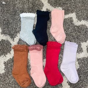7 pairs of little stocking co. socks 6-18mo th
